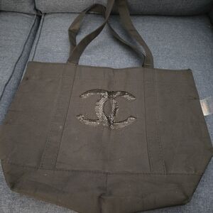 CHANEL Black Canvas Tote with Embellished Logo